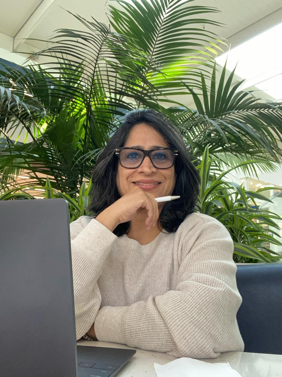 Portrait of Vandana Raj, founder of Divine Moms Hub and transformation guide